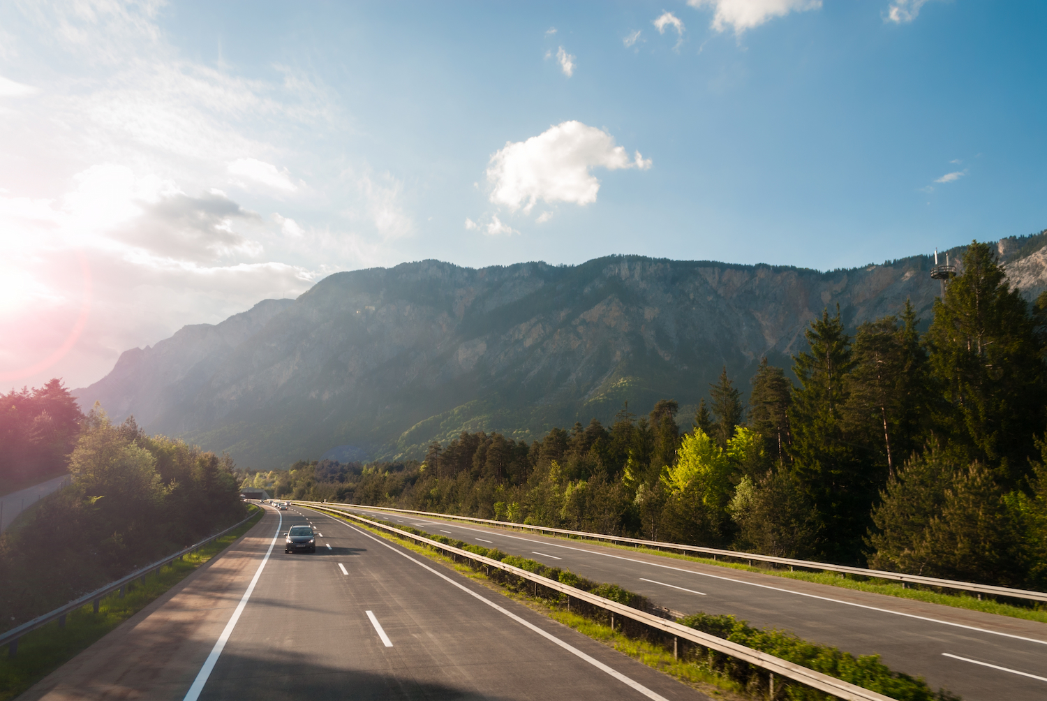 Picturesque motorway with mountains in background